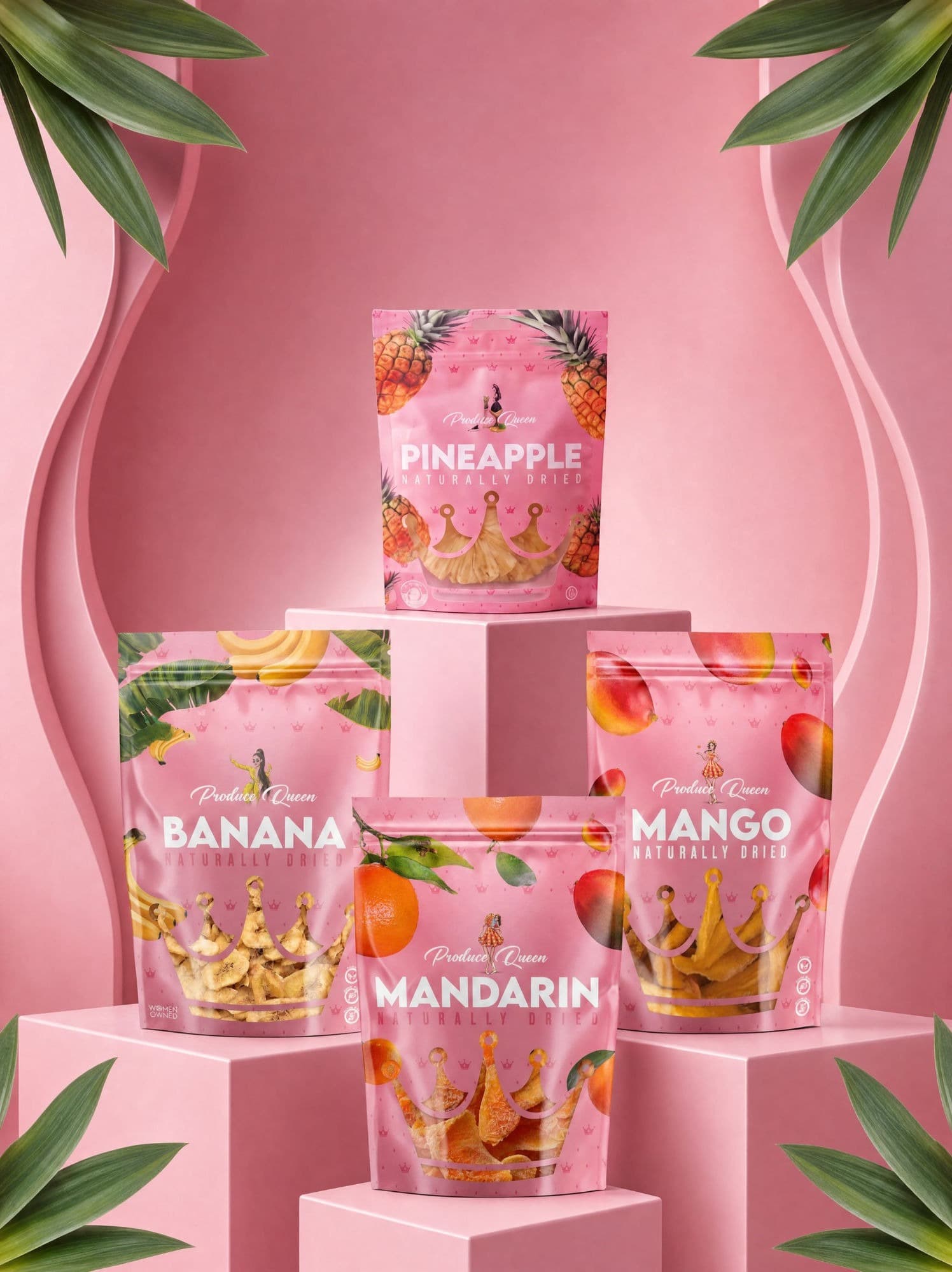 The Produce Queen naturally dried fruit lineup — Pineapple, Banana, Mandarin and Mango pouches arranged on pink podiums