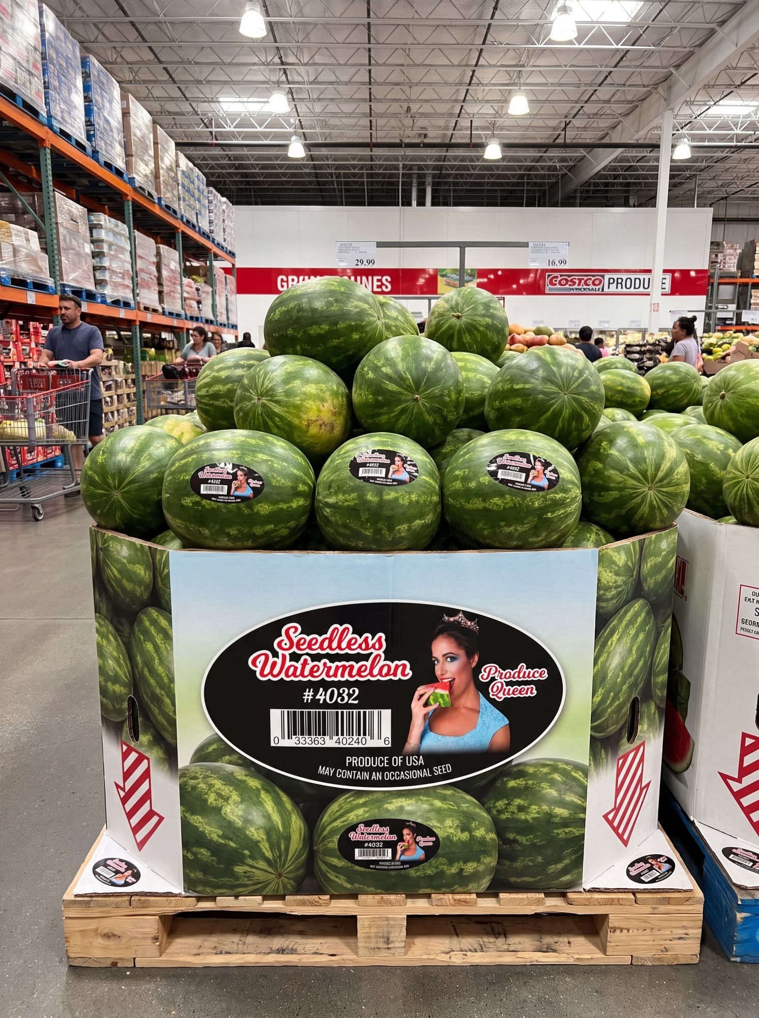 A Costco pallet display of Produce Queen branded Seedless Watermelon #4032